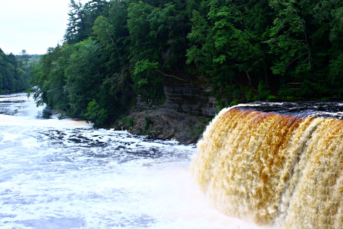 Tahquamenon Falls in the Upper Peninsula of Michigan is quite the site to see. Amazing and powerful! #TheTwinCedars #waterfalls #Michigan #travel #explore