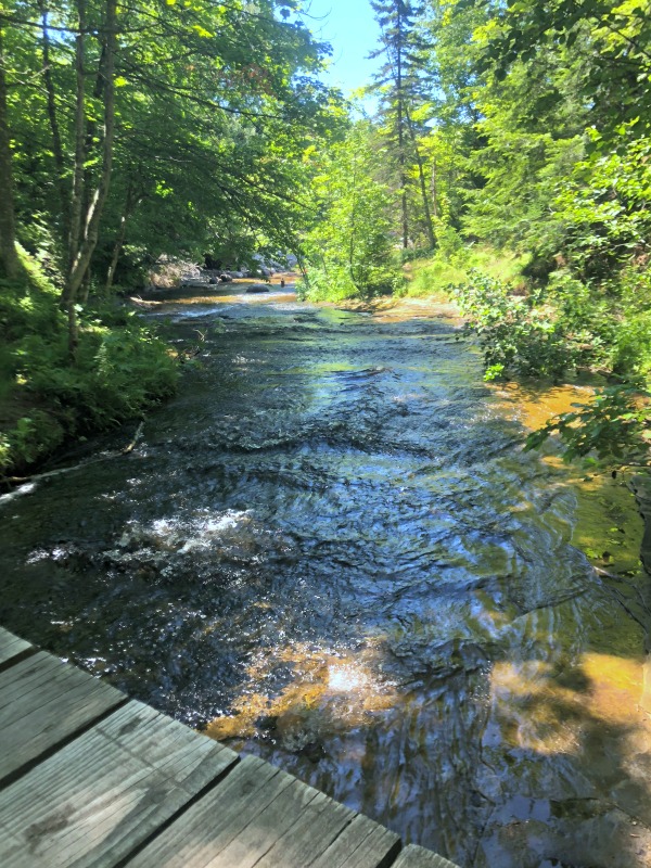 Pictured Rocks Kayaking crossing the river bridge