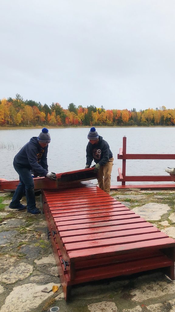 Removing docks on the lake at Twin Cedars Resort